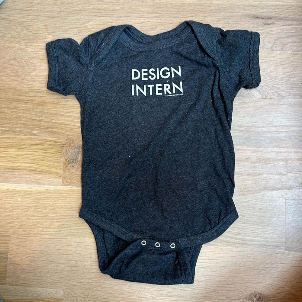 18M Charcoal Gray “Design Intern” Onesie.